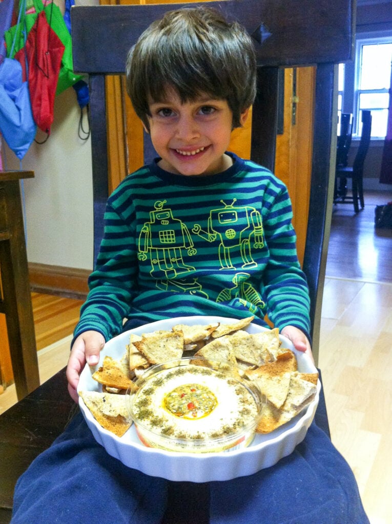 boy with homemade pita chips