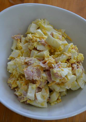 hardboiled egg with mayonaise cheese and ham