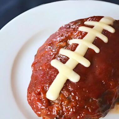 Football Shaped Meatloaf with mozzarella laces.