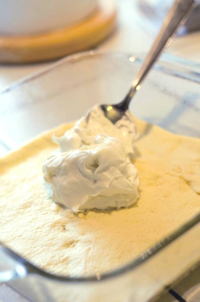 Cream cheese spread on crescent rolls