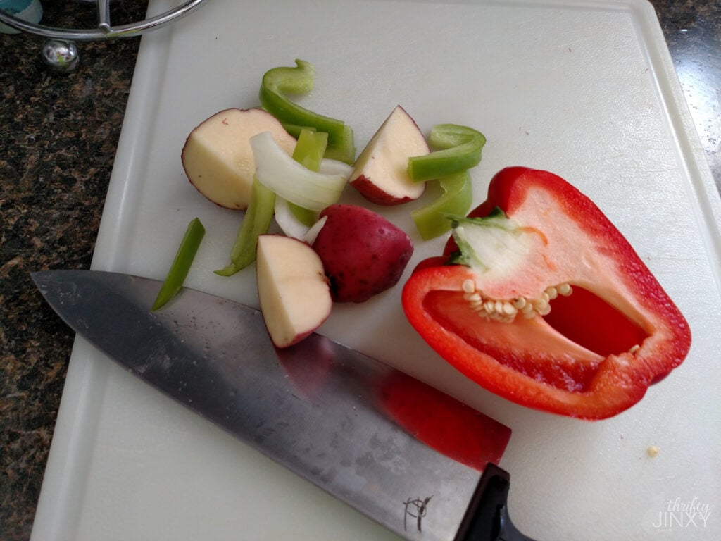 slicing peppers and potatoes