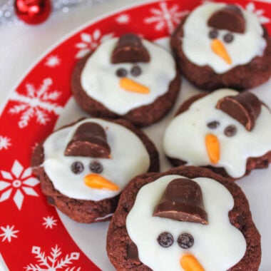 Melting Snowman Cookies on Red and White Plate