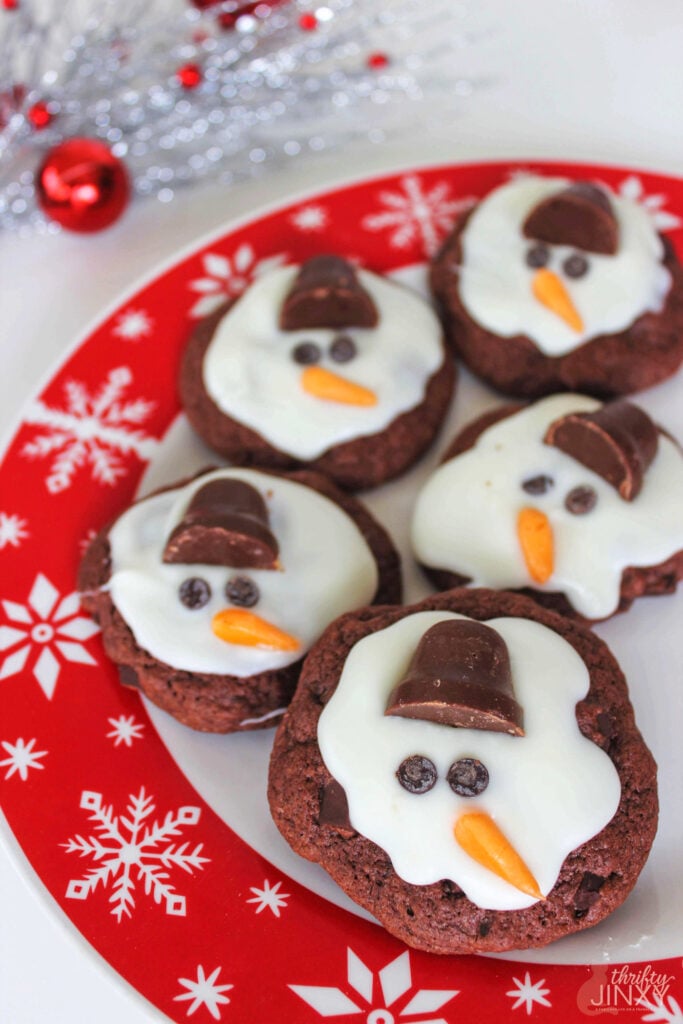 Melting Snowman Cookies on Red and White Plate