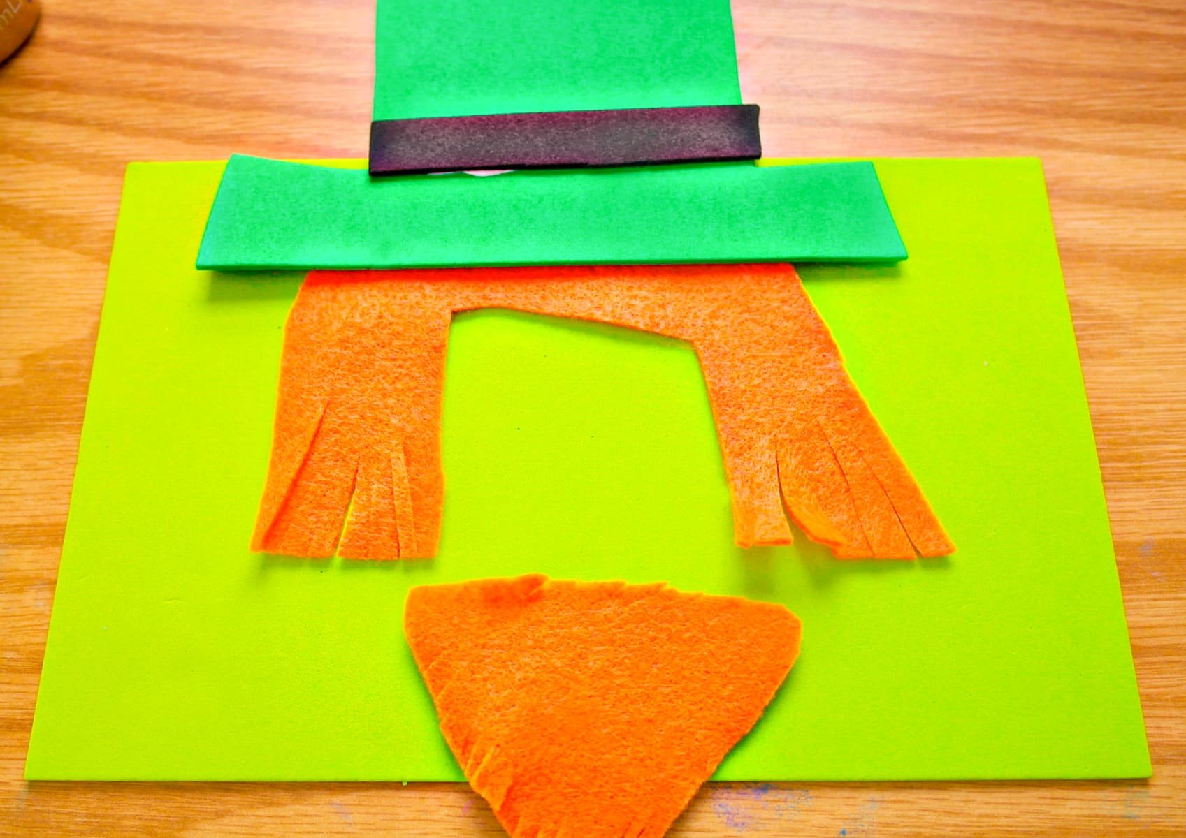 Process of making leprechaun photo magnet.