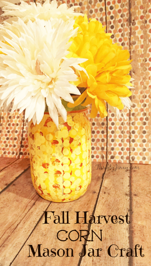 This DIY Fall Harvest Corn Mason Jar Craft is perfect to display an autumn bouquet, pens and pencils, or even your kitchen utensils!