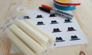 Easy Cheese Stick Snowman with Printable Hats - Thrifty Jinxy