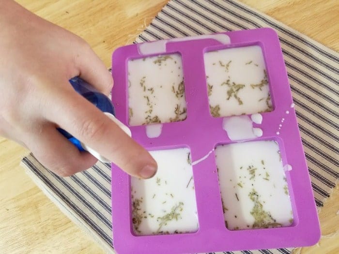 spray soap molds with rubbing alcohol to clear bubbles