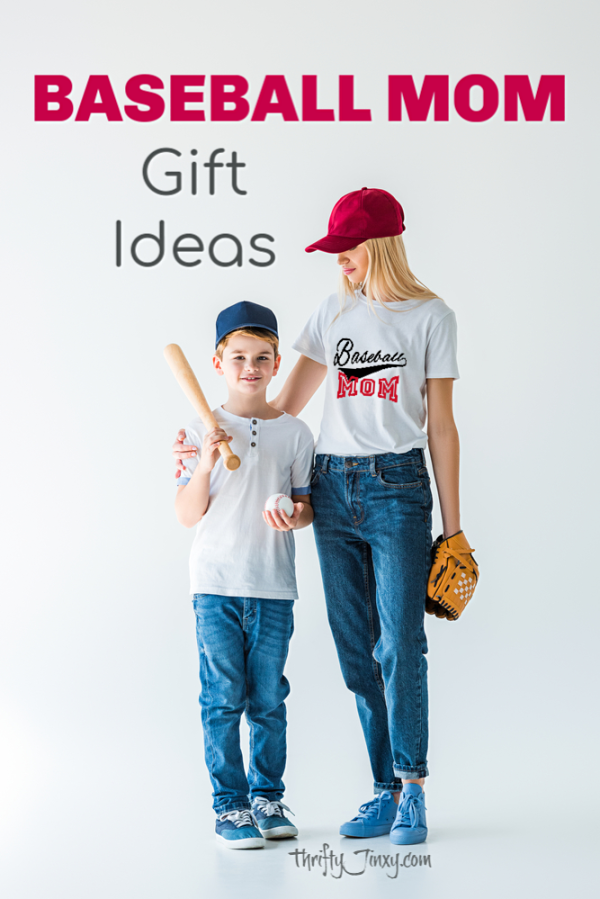 Mother and son wearing baseball hats with boy holding baseball bat and glove.