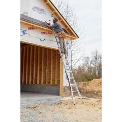 Man on Gorilla Ladder against Garage for Roofing Project