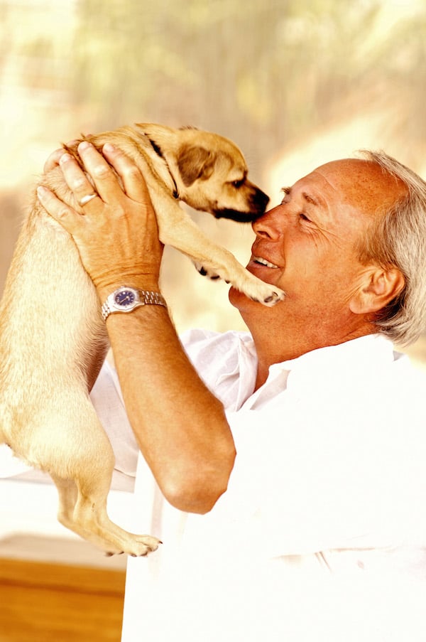 Man with Mixed Breed Puppy