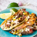 street tacos on a turquoise plate