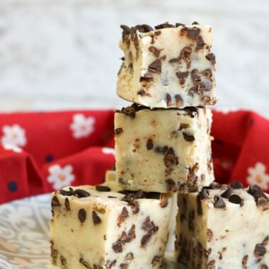 Chocolate Chip Cookie Dough Fudge in a stack on a plate