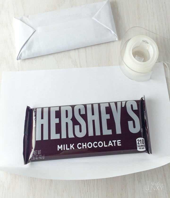 Hershey bar wrapping in white paper