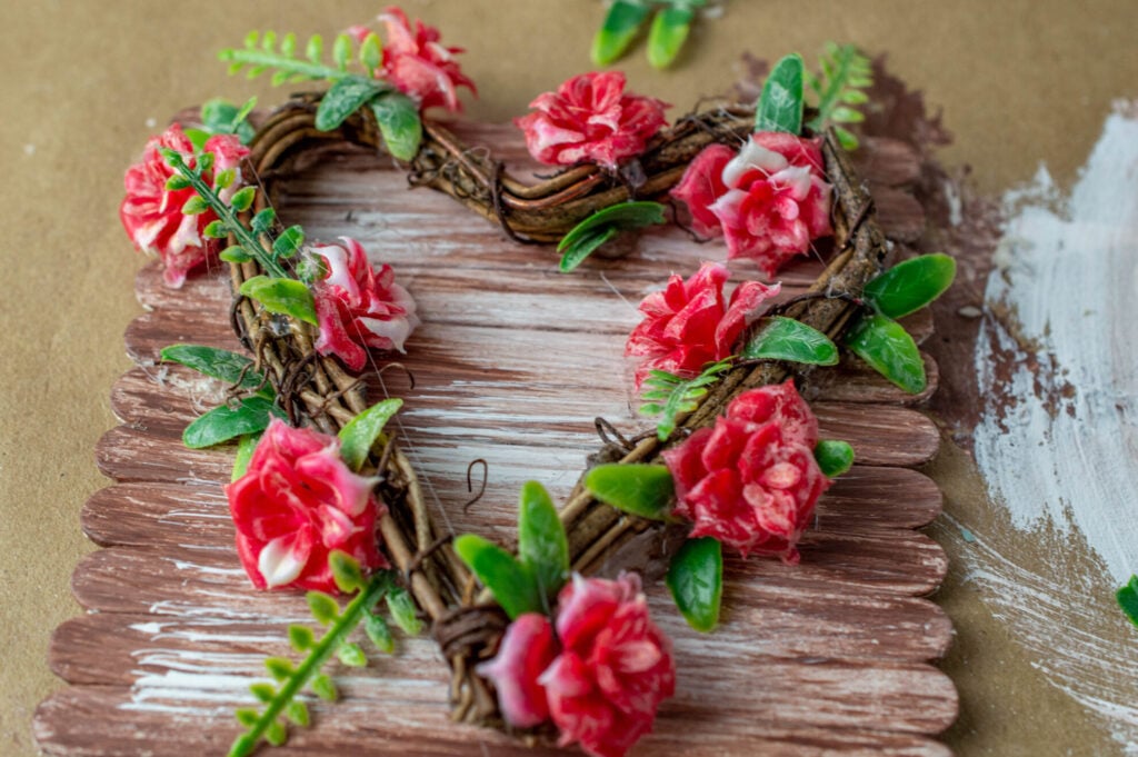 craft stick plaque with grapevine heart and flowers
