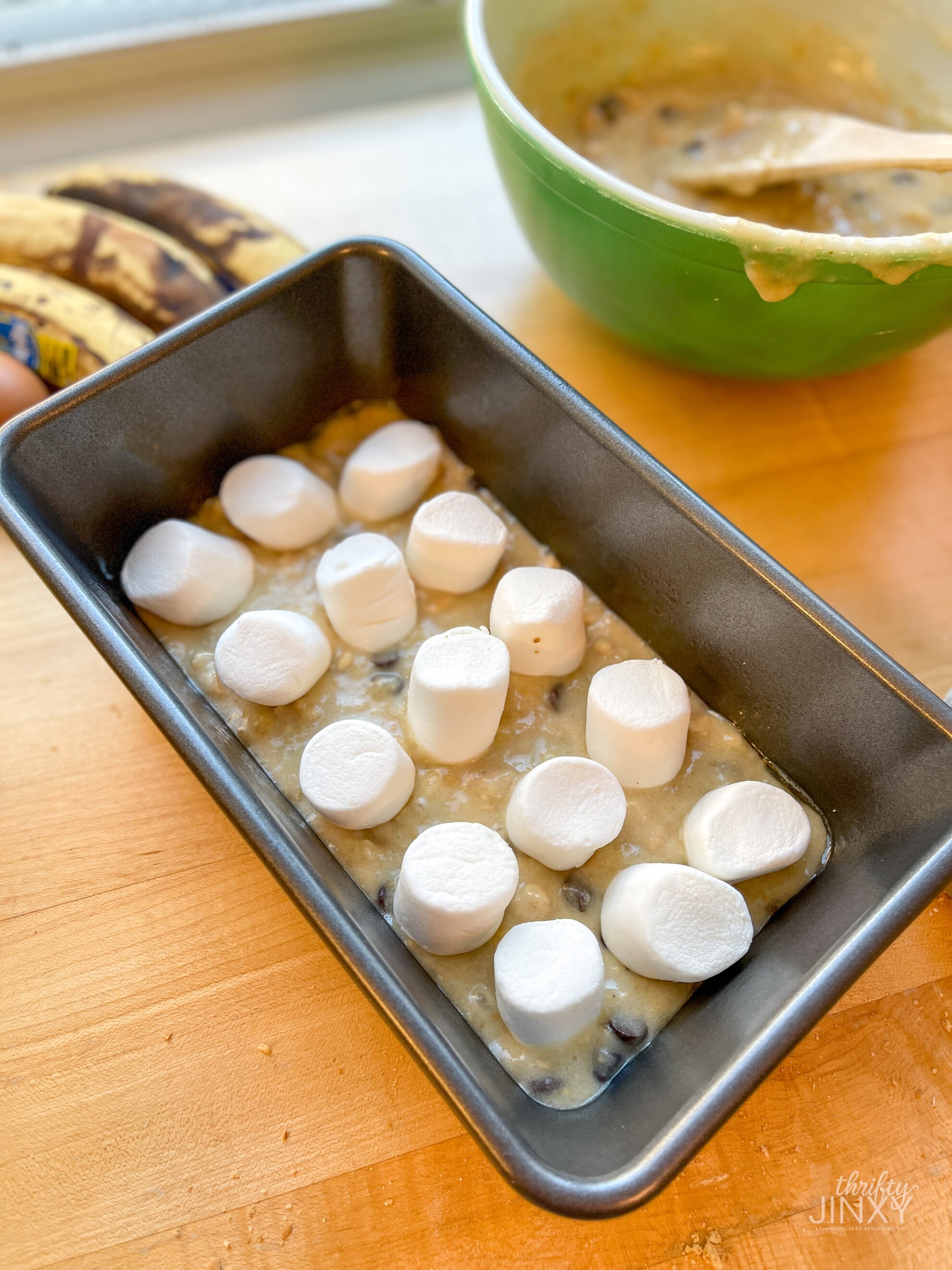 Placing Marshmallows in Banana Bread Pan