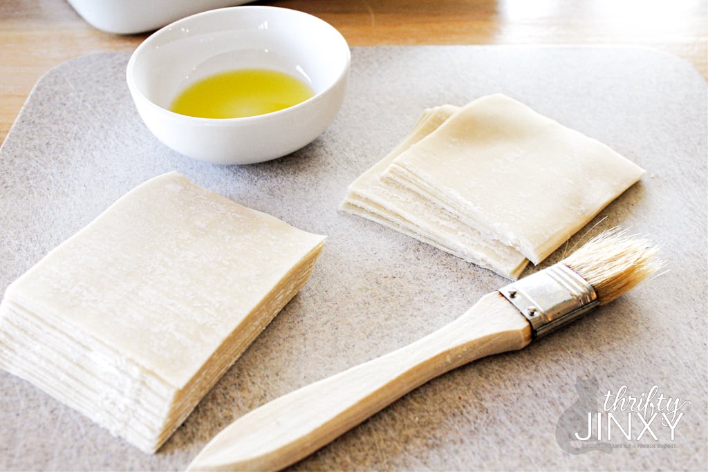 wonton wrappers with olive oil and pastry brush