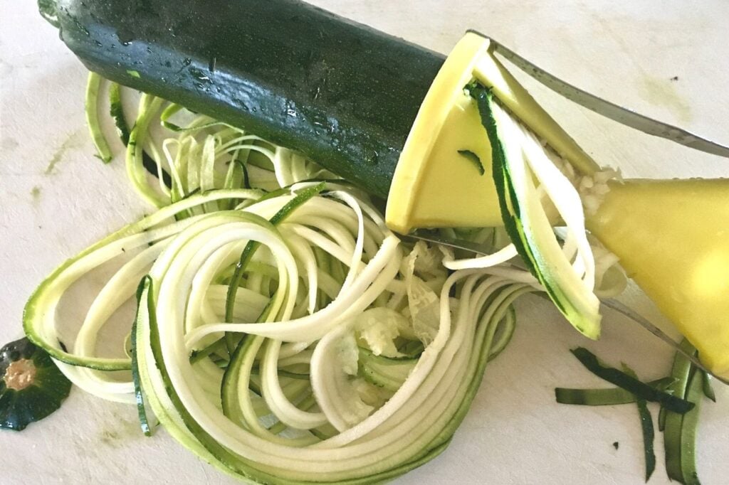 making zoodles from zucchini with a spiralizer