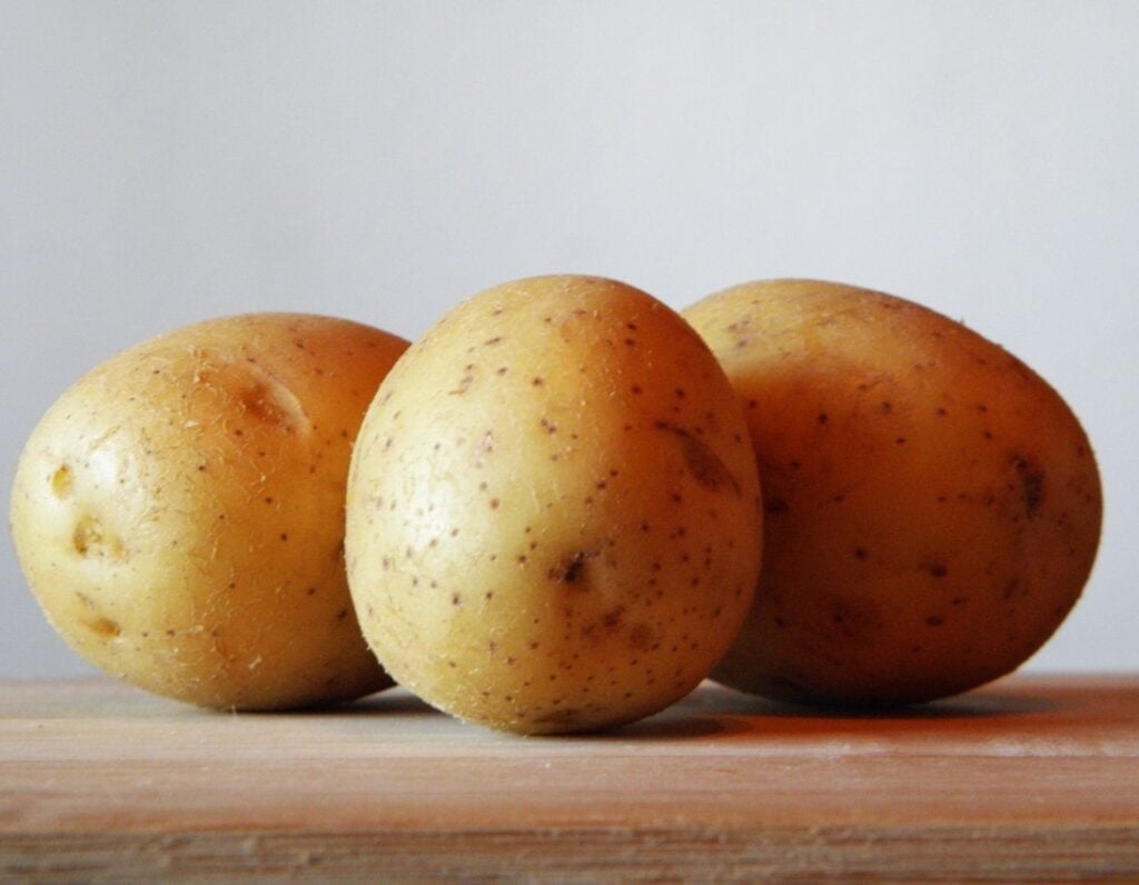 potatoes on cutting board