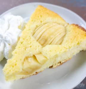German Apple Coffee Cake on Plate with Whipped Cream
