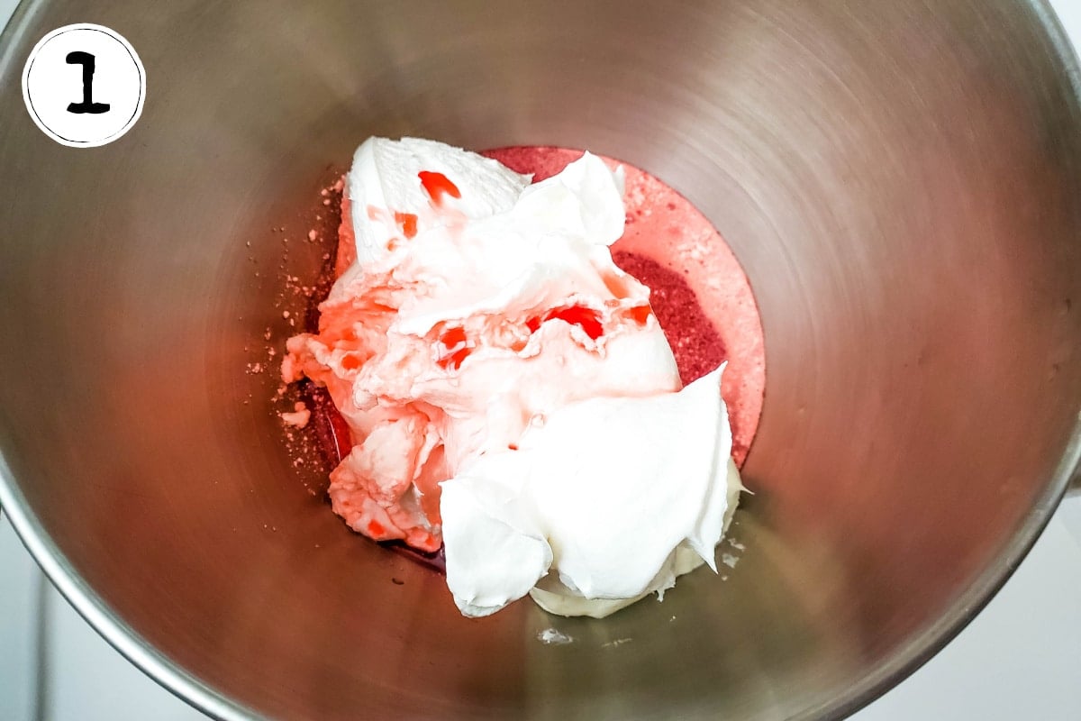 beating cream cheese and whipped topping with cherry juice.
