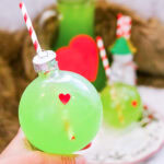 Grinch Punch in ornament with straw