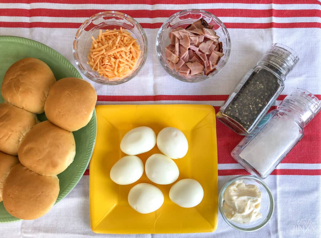 cheesy ham and egg sandwich ingredients: boiled eggs, mayonnaise, ham, cheese, buns, salt, pepper