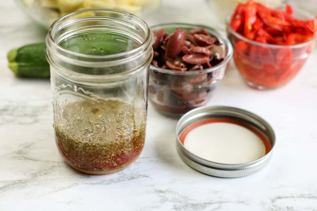 Mixing Greek Dressing for Low Carb Greek Chicken Casserole