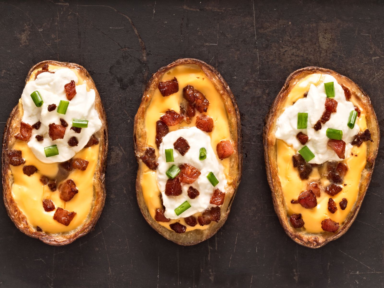 Game Day Potato Skins with cheese, bacon and sour cream