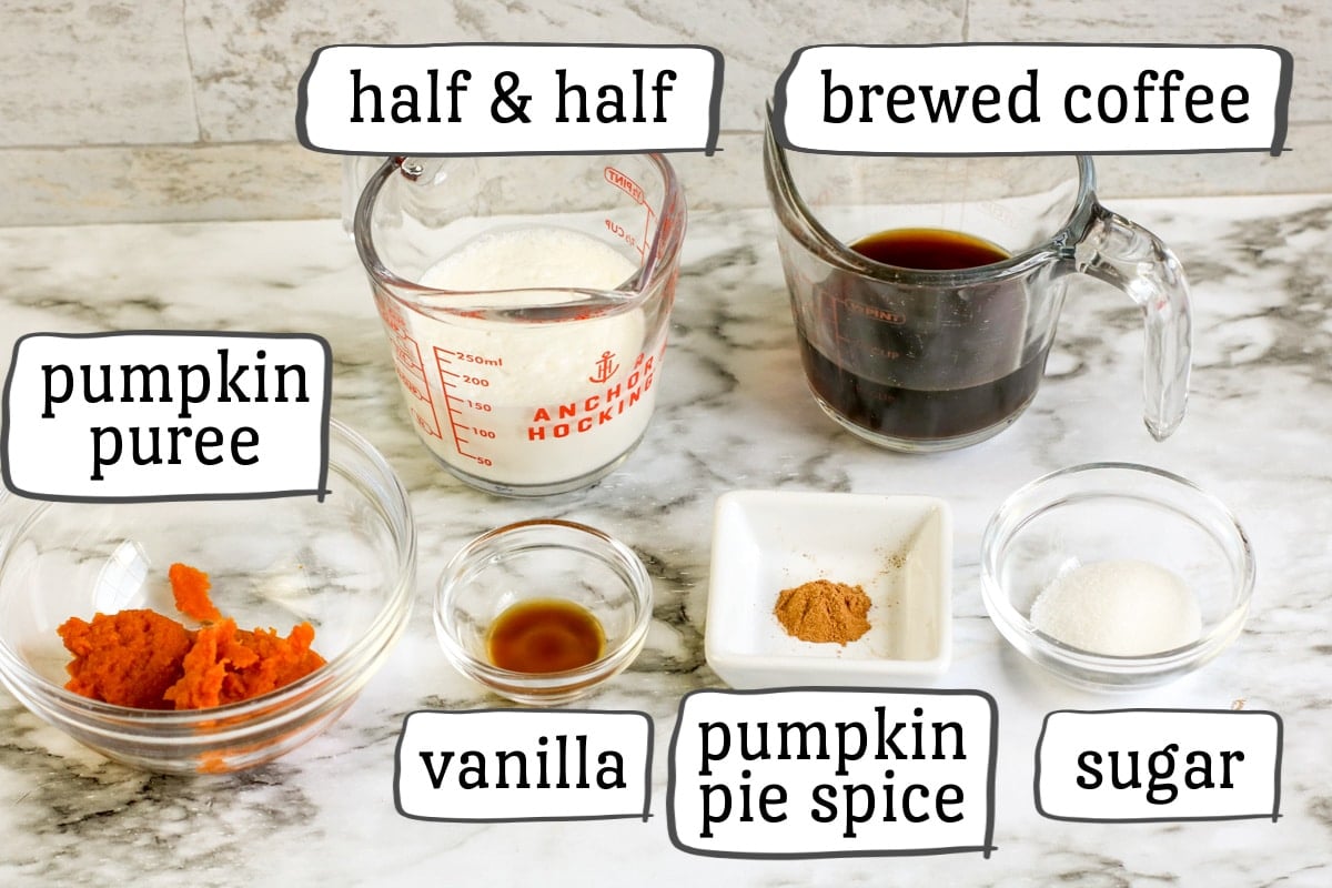 Iced pumpkin spice latte ingredients including brewed coffee, pumpkin puree, half and half, vanilla, pumpkin spice and sugar.