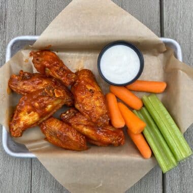 Buffalo Wild Wings 6 piece order traditional wings with carrots and celery.