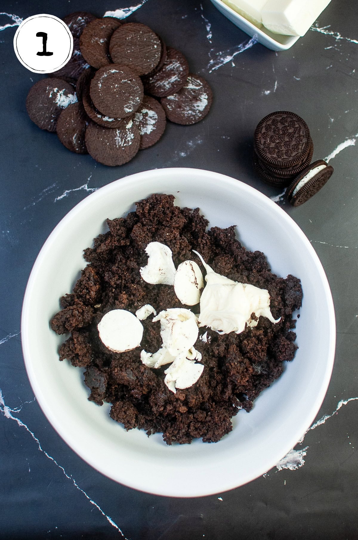 Mixing Copycat Starbucks Cookies n Cream Cake Pops Ingredients in Bowl.