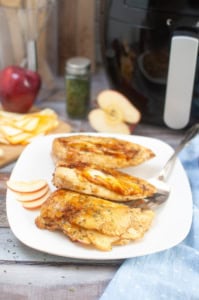 Apple and Muenster Stuffed Chicken Breast on a white plate