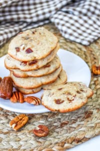 pecan date spice cookies on a white plate