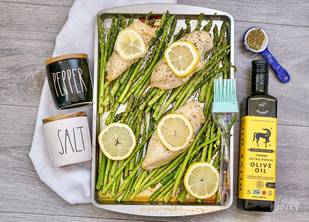 Preparing Sheet Pan Chicken and Asparagus for Oven.