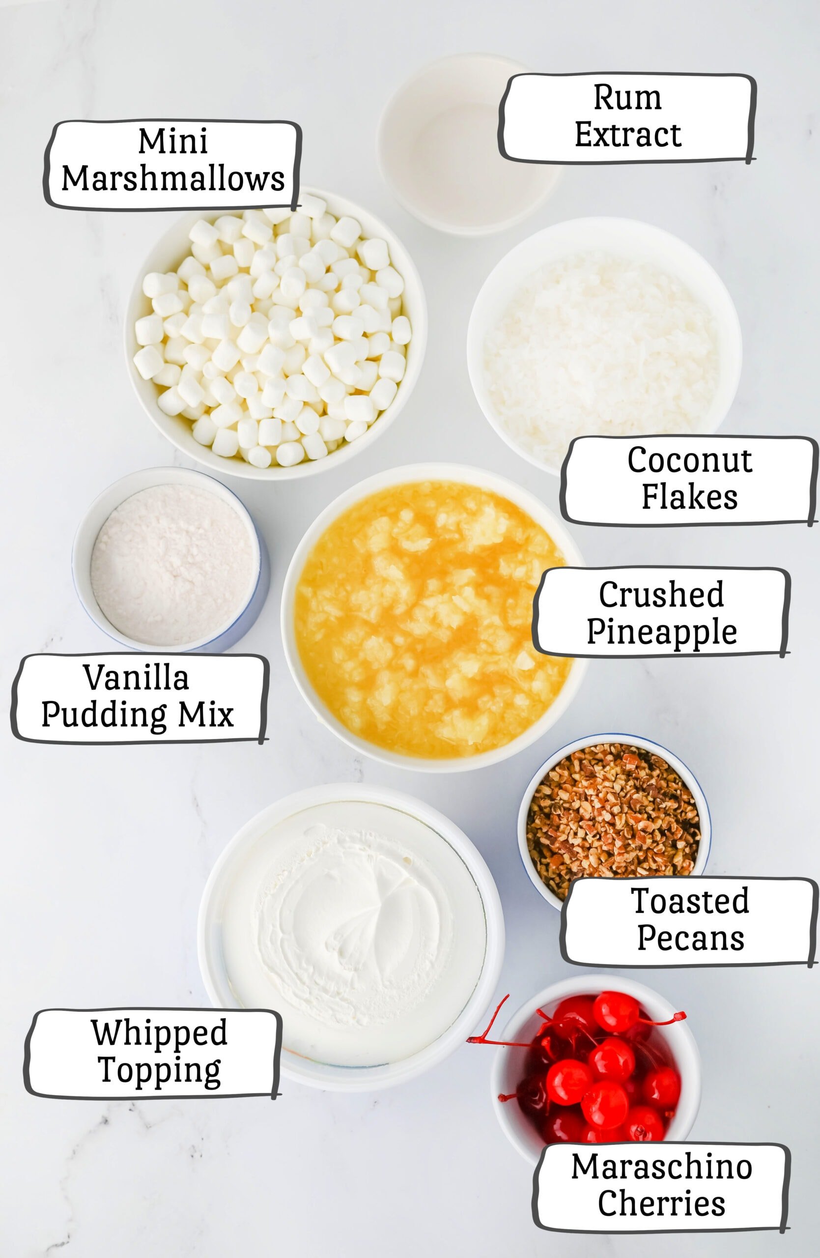 Ingredients for a marshmallow salad dessert with pineapple, coconut and nuts.