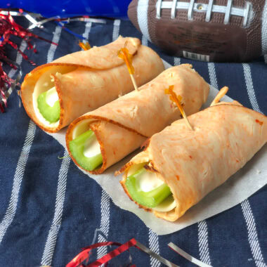 Buffalo Chicken RollUps with celery, provolone and blue cheese dressing.