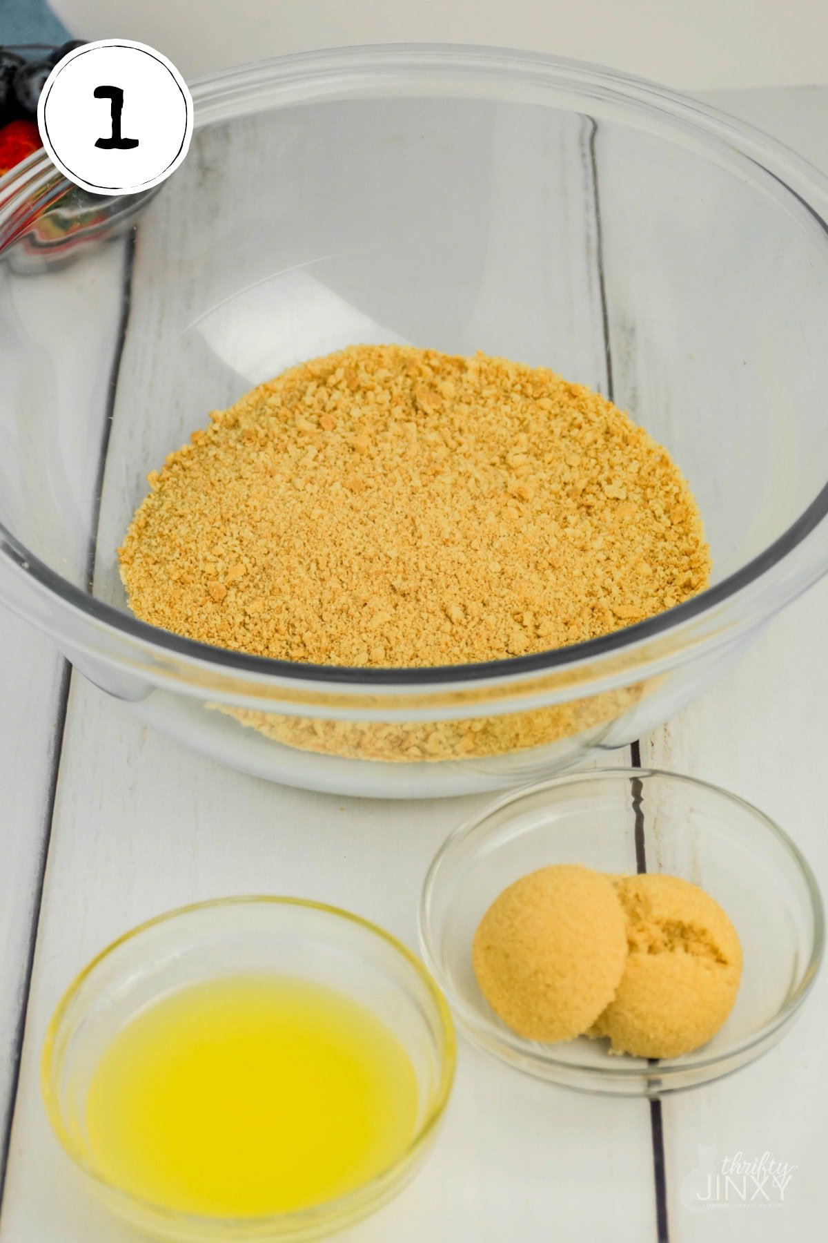Mixing Ingredients for Mini No Bake Cheesecake crust with graham crackers.