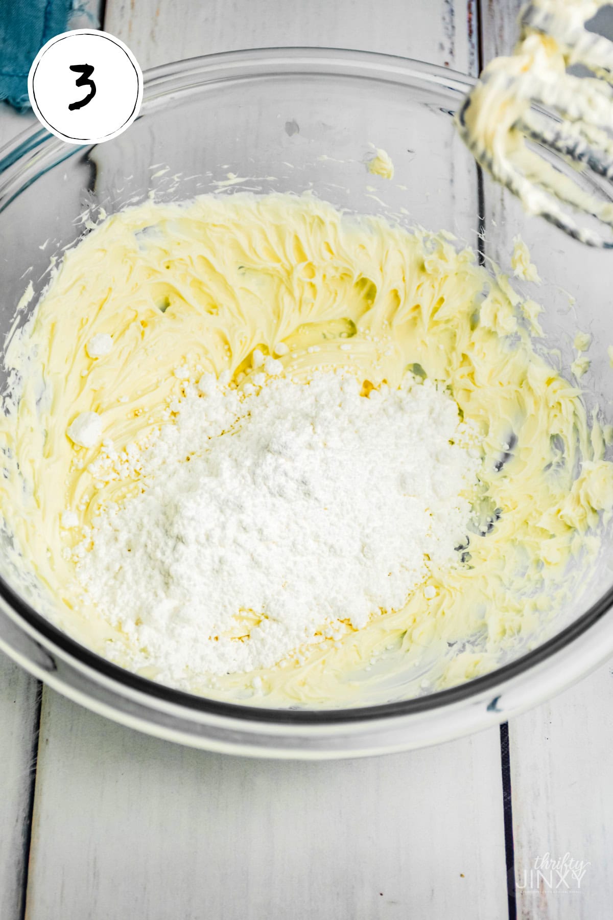 Preparing filling for Mini No Bake Cheesecakes.