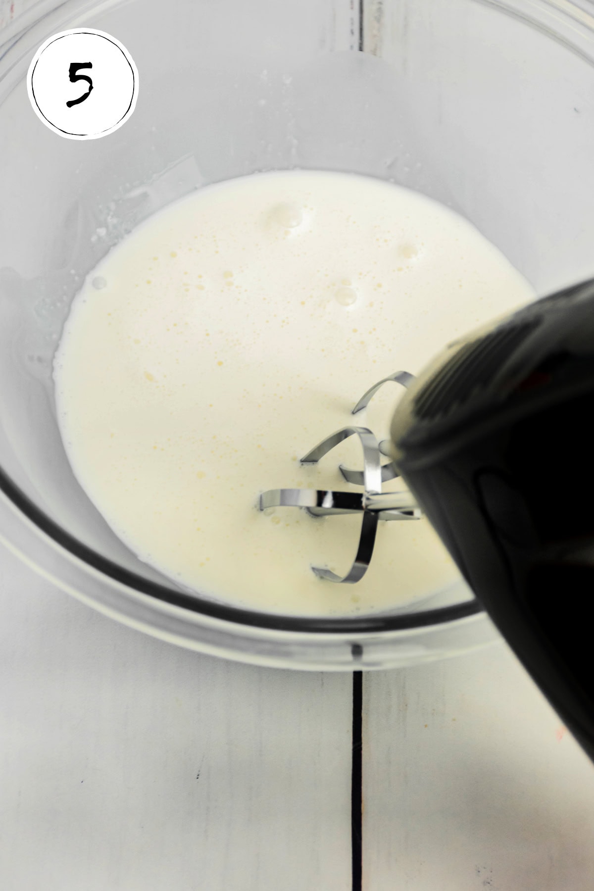 Whipping cream for Mini No Bake Cheesecakes.