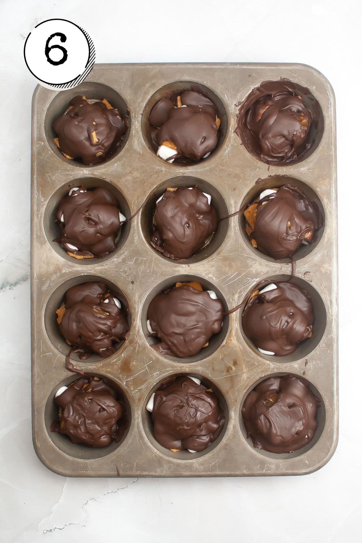 Allowing chocolate to fully set before serving.