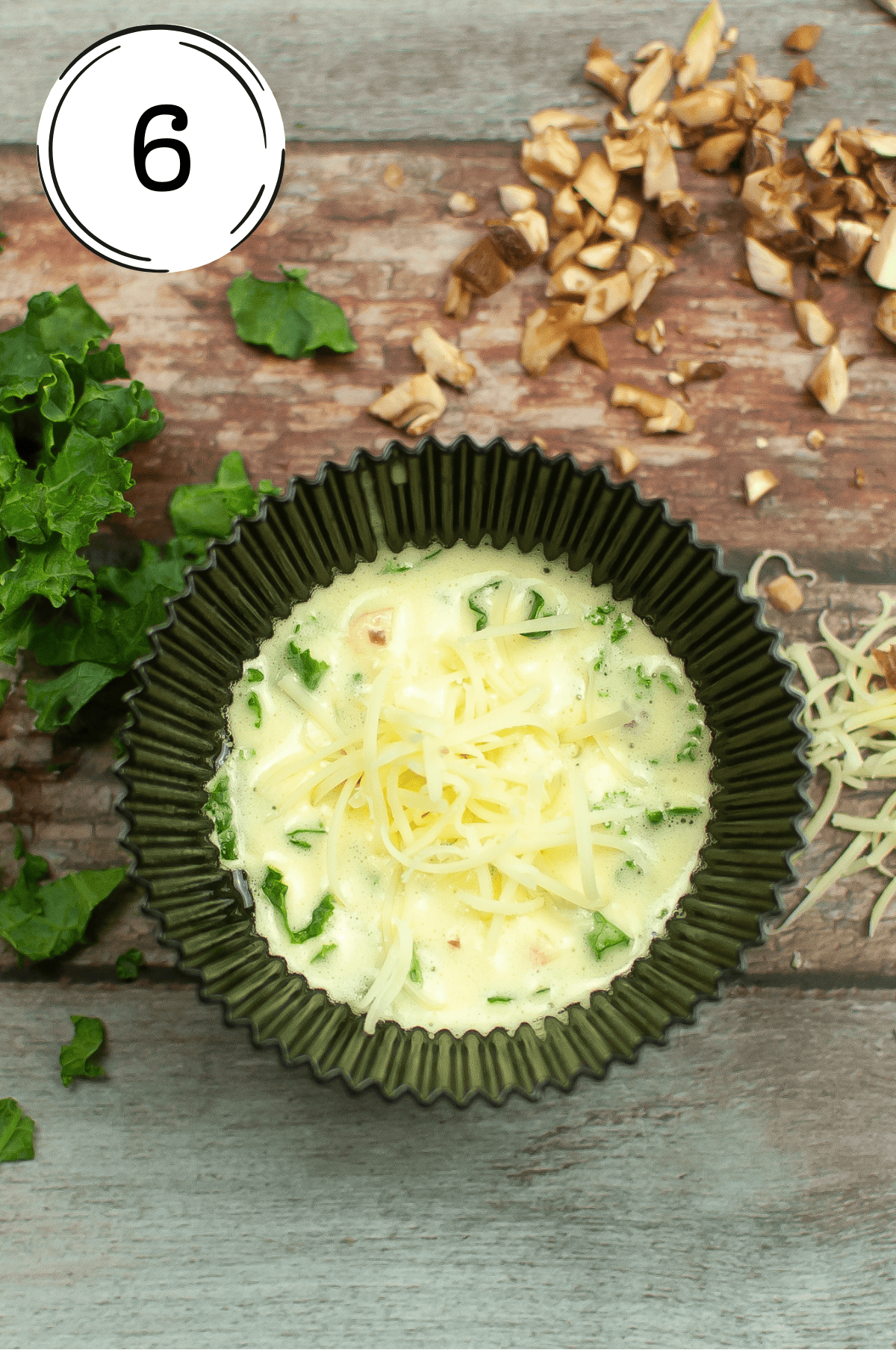 sprinkling the remaining Gruyère, the kale and mushrooms.