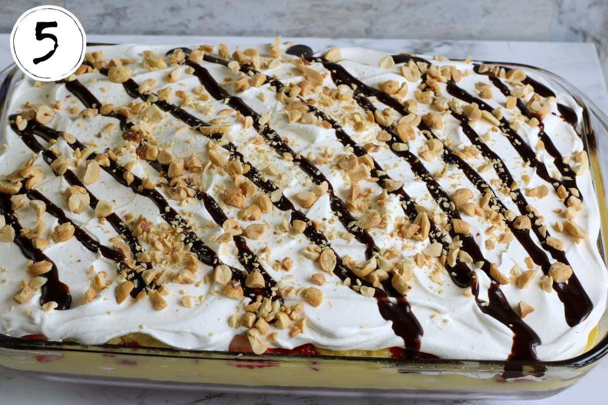 Adding Toppings to Banana Split Poke Cake.