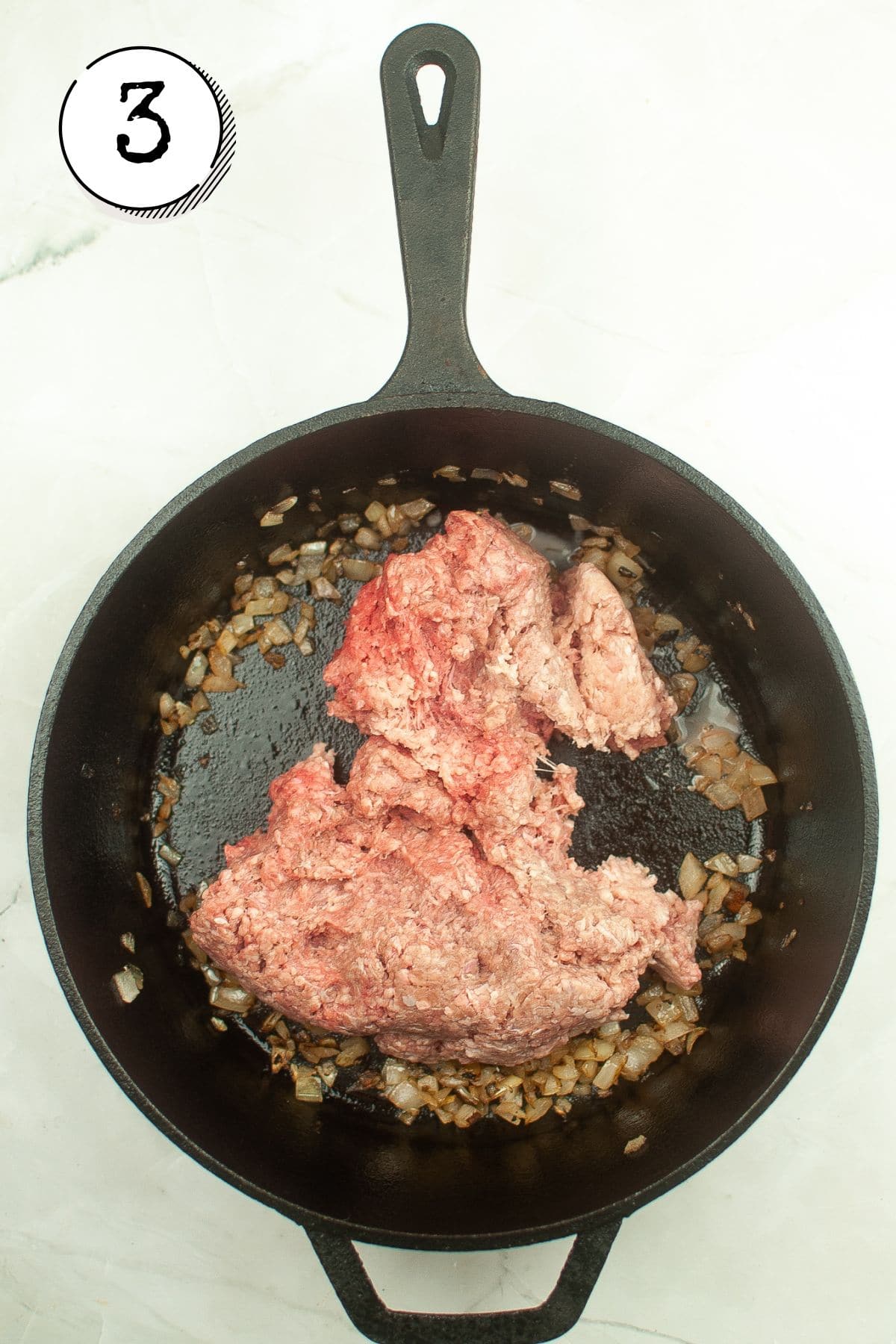 Cooking meat until brown.