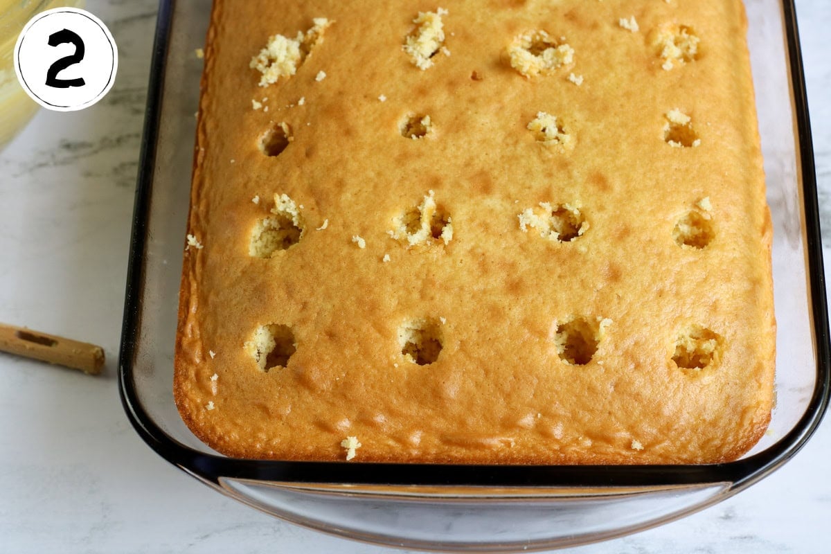 Making Holes for Banana Split Poke Cake.
