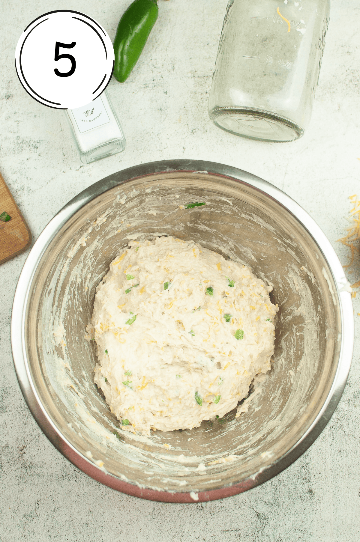 Covering with a damp cloth or plastic wrap