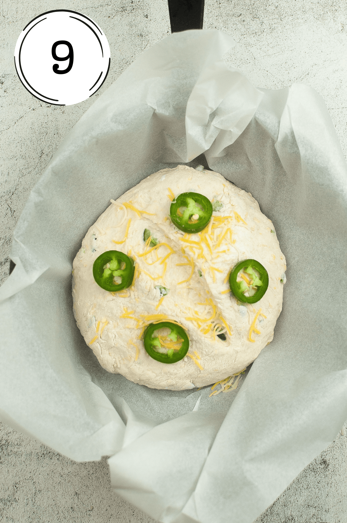 Lightly sprinkle the loaf with ingredients