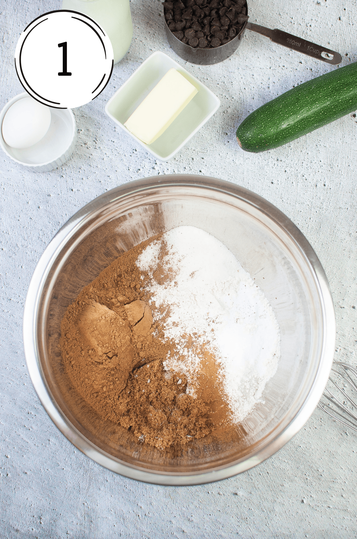 Air Fryer Double Chocolate Zucchini Muffins first step in the process