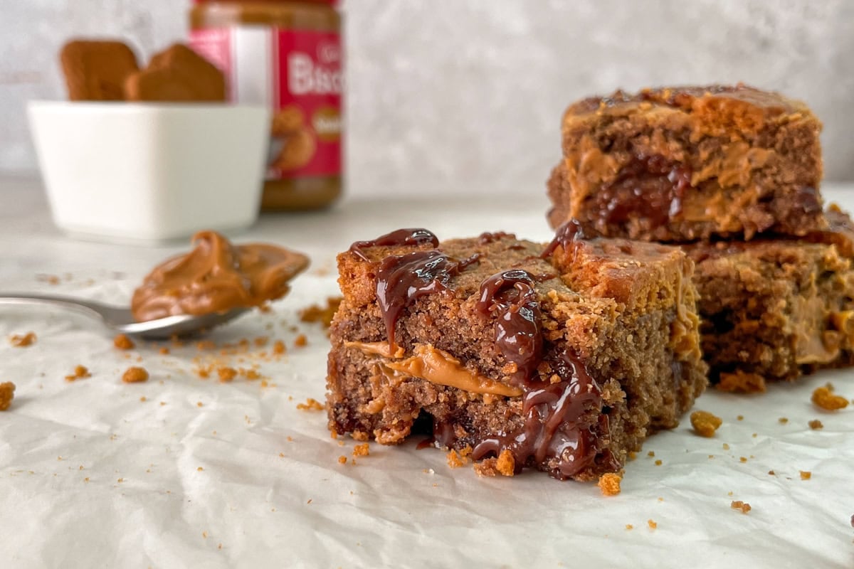 Biscoff Brownies with Bowl of Cookies and Cookie Butter.