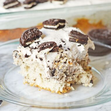 Oreo Cookies and Cream Poke Cake.