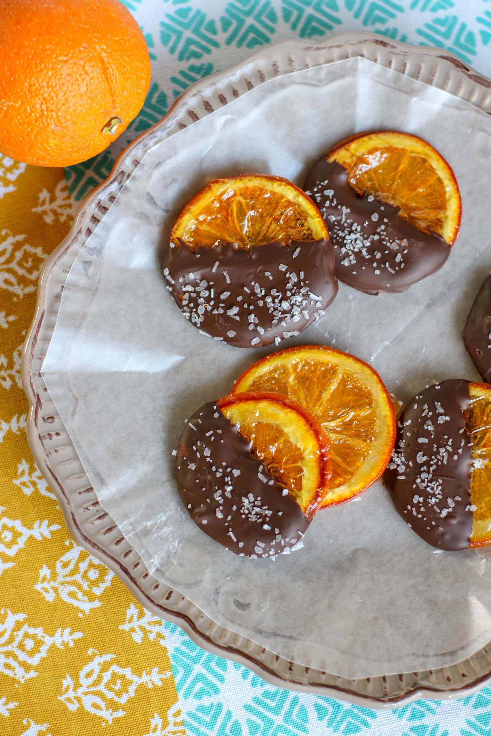 Dark Chocolate Dipped Candy Oranges with blue mantle